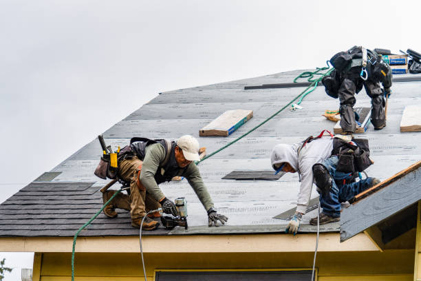 Professional Gutter Installation technician working in Batesville, MS